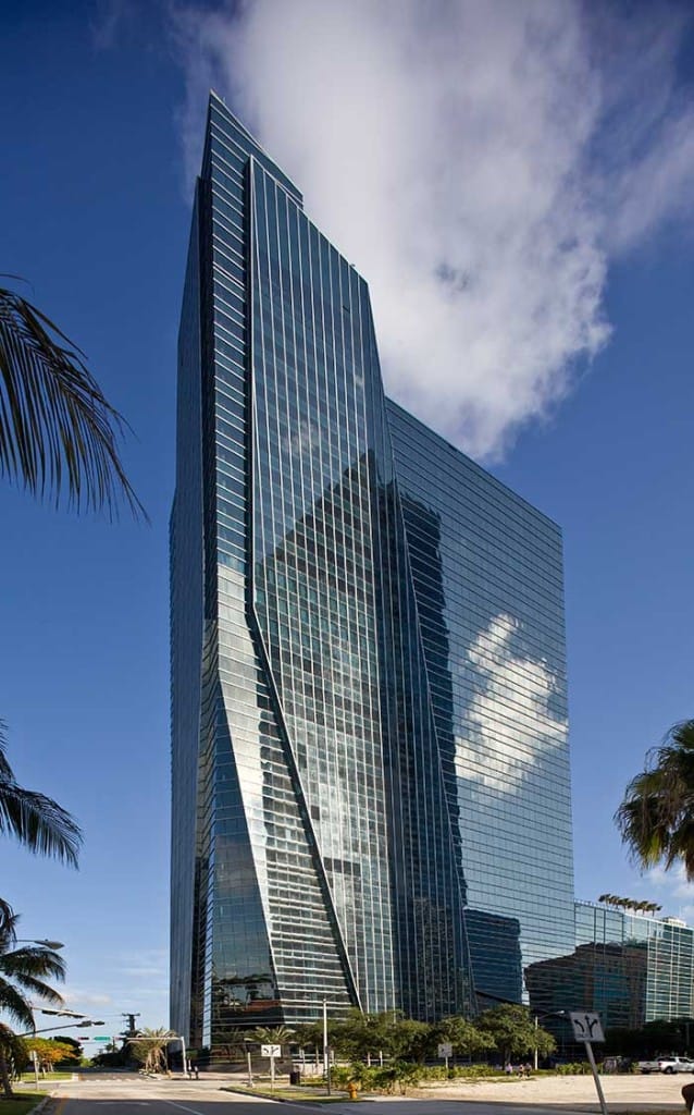 The 1450 Brickell building is a resilient structure that features impact-resistant blue glass throughout the building, not just on the lower floors as required by code. The glass is designed to resist shattering when struck by large projectiles that typically fly through the air during a hurricane.