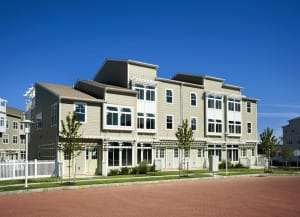 Each two-family unit includes two separate entrances—one for owners and the other for tenants. This attached structure includes four two-family units, with eight entrances. (Arverne by the Sea LLC)