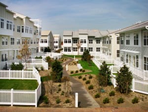 The community design includes a variety of storm-resistant elements and features, including storm drains in front- and backyards of each two-family unit. Over a half million cubic yards of fill dirt were brought in to raise the grade of the site. (Arverne by the Sea LLC)