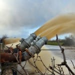 Pumping floodwater into River Parrett, Somerset, England, during 2014 floods. Credit: LA(Photo) Rhys O’Leary/MOD