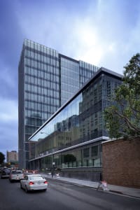 The three-building complex includes a separate three-story office building—50 Hawthorne Street—that has been leased to athenahealth.
