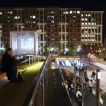 At night, the restaurant pavilion glows from within.