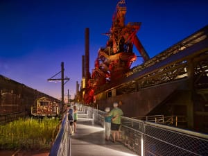The steel stacks are beautifully lit at night, drawing visitors to the site even when there are no events scheduled. (Halkin/Mason Photography for WRT)